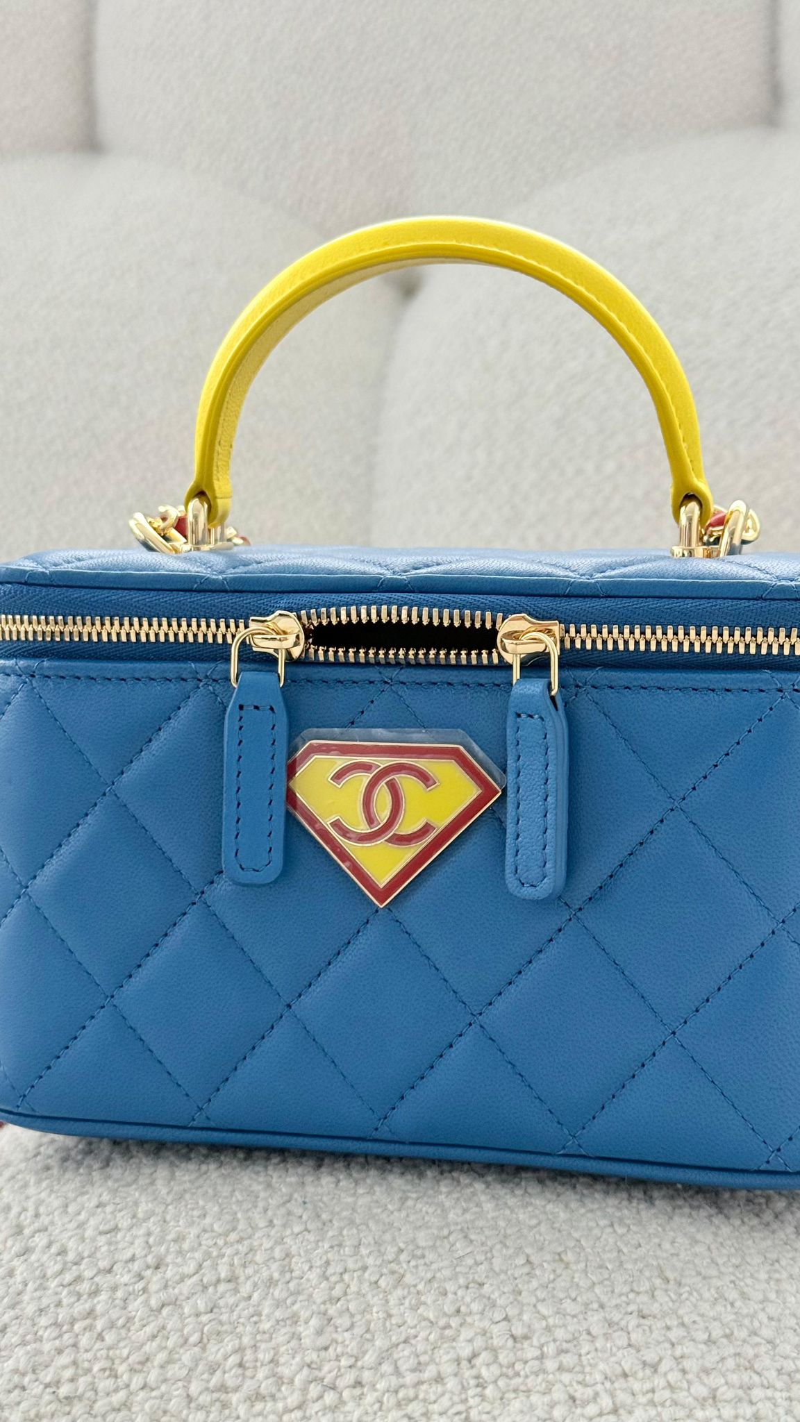 Chanel Metiers d’Art 2026 Long Vanity with Chain Calfskin, Enamel & Gold-Tone Metal Blue, Yellow & Red