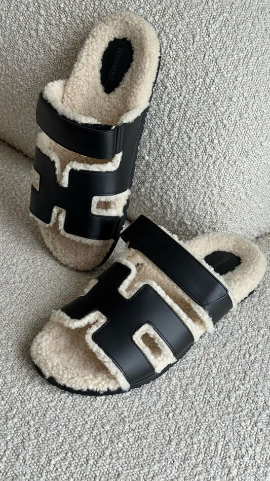 Hermès Chypre Sandals Calfskin & Shearling Black & Ecru